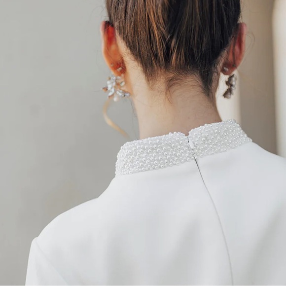 White mini dress with fur trimming from Untamed Petals. - Picture 6 of 6